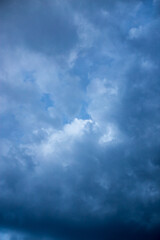 Beautiful clouds at sunset after rain as background .