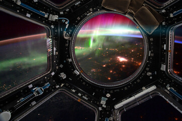 Earth and Spacecraft. Elements of this image furnished by NASA.