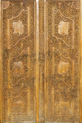 Carved wooden door of a church in the old town of Chania in Crete, Greece. 
