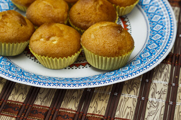 A lot of tasty muffins with banana filling