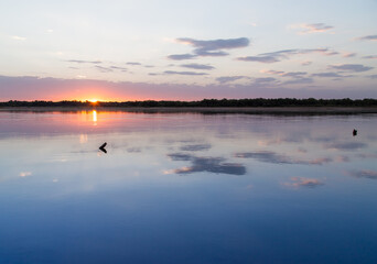 sunset on the lake as a backdrop