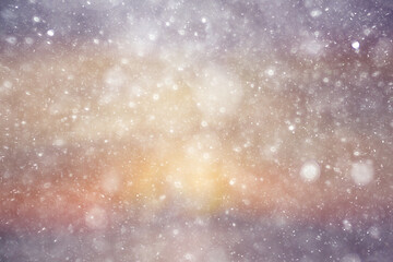 Obraz premium Snowfall texture of snowflakes on blurred background