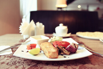 Salmon grill restaurant serving