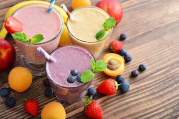 Three glass of fruit milkshakes