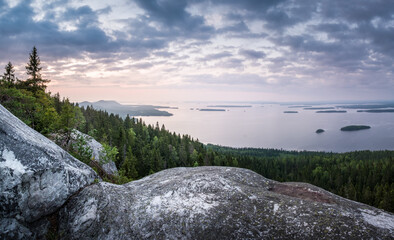 Scenic landscape with lake and sunset at evening in Koli, national park, Finland - 157511315