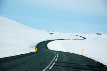 Naklejka na ściany i meble Winding road, snow, blue sky, Dettifoss, Iceland