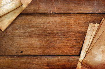 old papers texture on wooden background