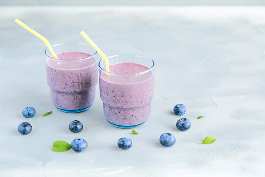 Fresh Cold Blueberry Smoothie in Glass Copy Space