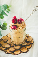 Healthy chocolate banana ice cream, raspberries.Toning.