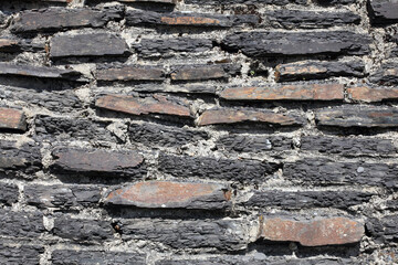 Old weathered rustic stone wall background