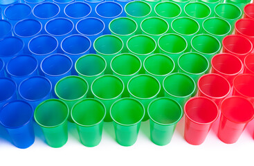 Multicolor plastic glasses isolated on white background