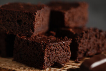 Brownie with milk on a dark background