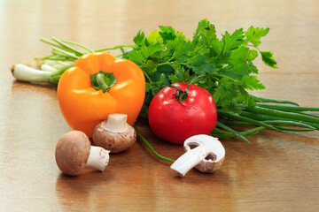 Set of fresh natural products with pepper, tomato, mushrooms, onion and parsley