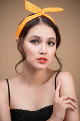 Beautiful woman pinup style portrait. Asian woman.