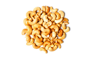 Heap of roasted cashew nuts on white
