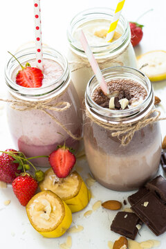 Banana chocolate and strawberry milkshakes