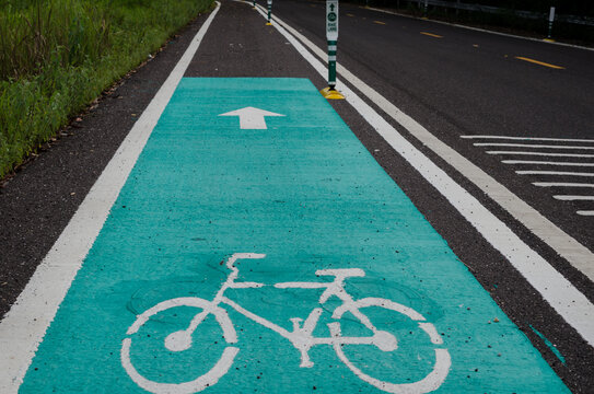 Bicycle road sign on asphalt in Thailand.