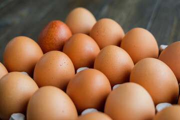chicken eggs on wooden background
