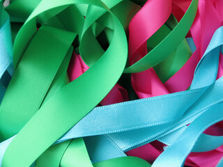 Colorful ribbon over white background