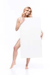 blond woman holding blank banner in hands isolated on white