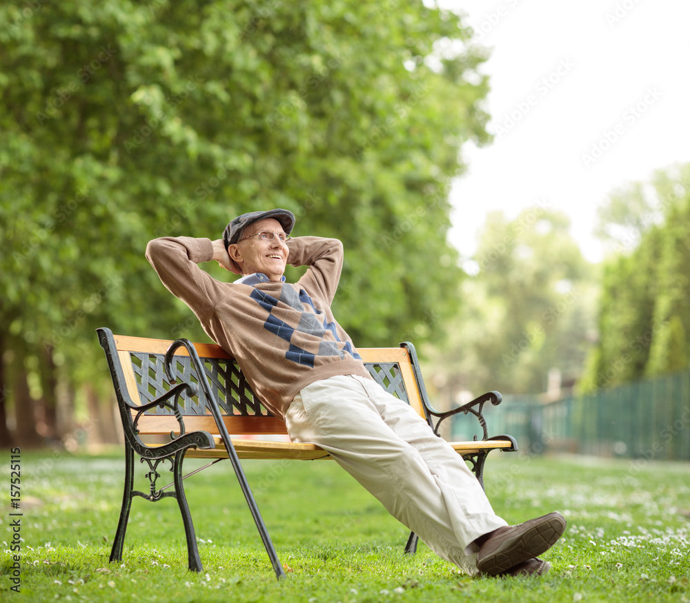 Canvas Prints senior relaxing on a wooden bench