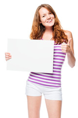 Fototapeta premium A satisfied girl holds an empty poster for advertising