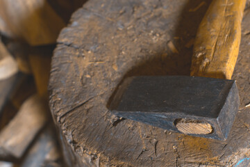 The ax on the stump.