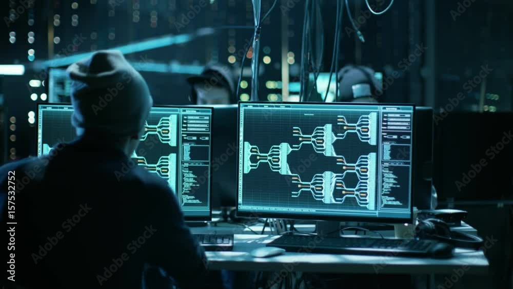 Aufkleber Team of Internationally Wanted Hackers Teem Organize Advanced Malware Attack on Corporate Servers. Place is Dark and Has Multiple displays.Shot on RED EPIC-W 8K Helium Cinema Camera.