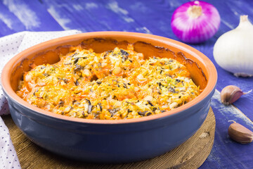 Vegetarian cabbage lazy rolls with mushrooms a in a baking dish.