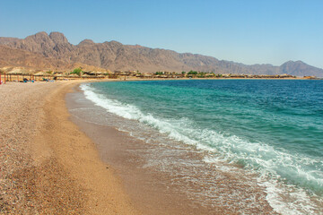 Cottage in a Camp in Sinai, Taba desert with the Background of the Sea and Mountains.