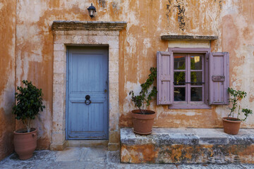 Fototapeta na wymiar Door in a monastery in Chania region on Crete island, Greece.