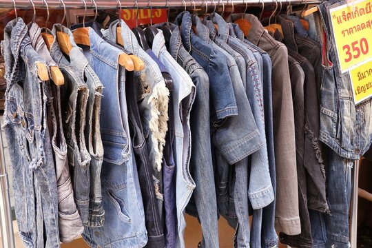 jeans clothes on hangers