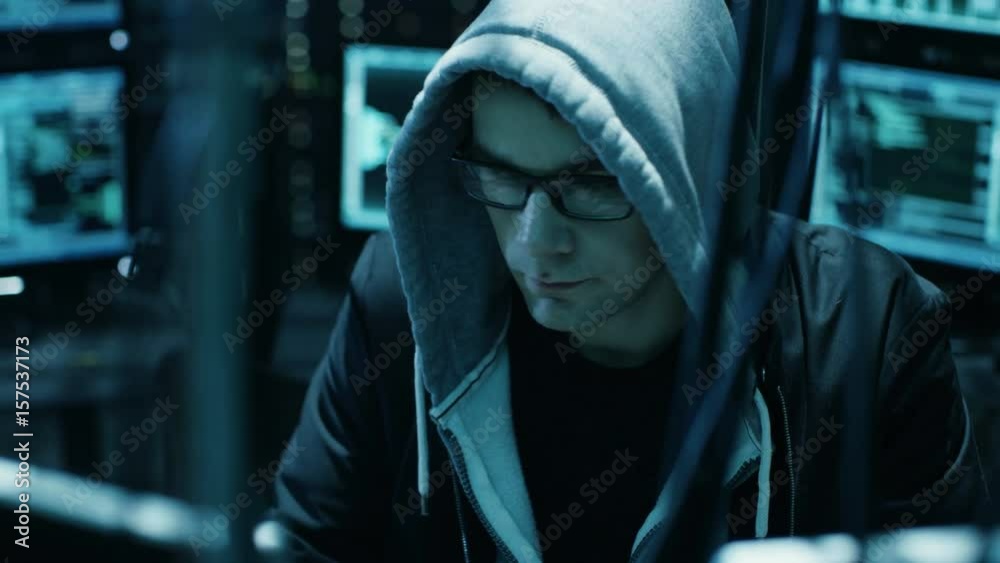 Aufkleber Dangerous Hooded Hacker Breaks into Government Data Servers and Infects Their System with a  Virus. Shot on RED EPIC-W 8K Helium Cinema Camera.