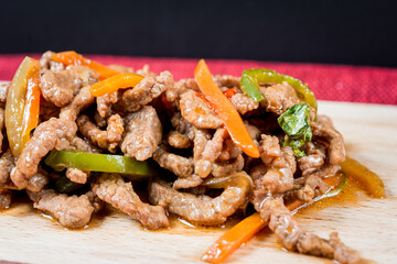 wok fried beef stir fry with sweet peppers and chinese vegetables