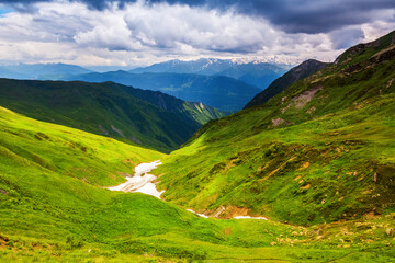  Landscape with picturesque meadows and mountains.
