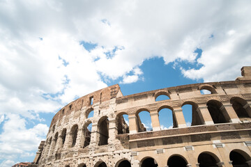 Obraz premium The Colosseum, an oval amphitheatre in the center of the city of Rome, Italy. It is the famous landmark built of concrete and sand.