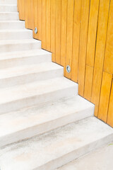 Cement stairs with wooden background
