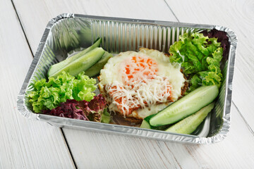 Healthy food in boxes, diet concept. Vegetable Salad
