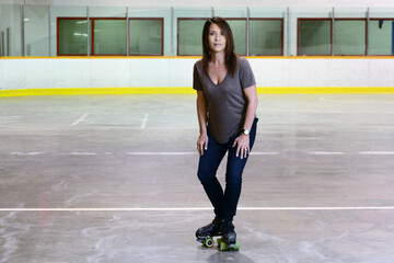 woman doing t stop move on quad roller skates