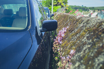 Car parked skilfully close to a wall