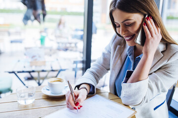 Beautiful Young Woman Talking on the Phone