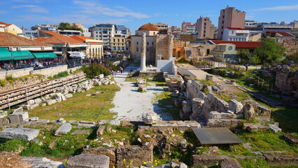 Photo from picturesque Plaka area in center of Athens and Roman Forum archaeological site, Attica, Greece