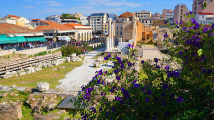 Photo from picturesque Plaka area in center of Athens and Roman Forum archaeological site, Attica, Greece