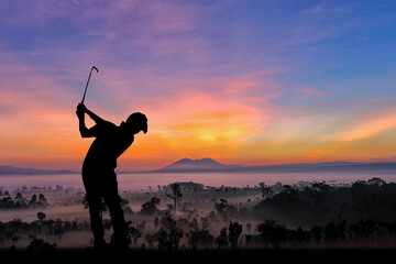 silhouette of golfers hit sweeping and keep golf course in the summer for relax time