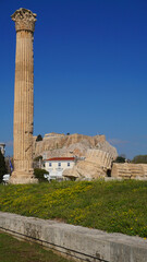 Photo of iconic pillars of Temple of Olympian Zeus with view to the Acropolis and the Parthenon,...