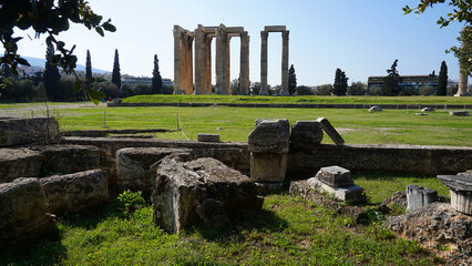 Photo of iconic pillars of Temple of Olympian Zeus with view to the Acropolis and the Parthenon,...