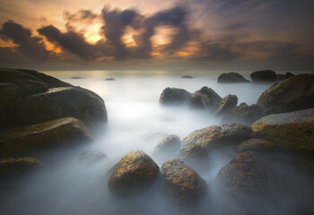 Dreamy effect of waves is achieved using long exposure technique.