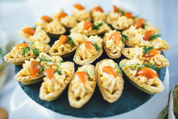 Baked bascket with salty styff and tomatoes
