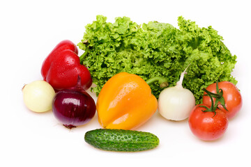 cucumber, peppers, leafy vegetables, lettuce leaf with tomatoes and onion