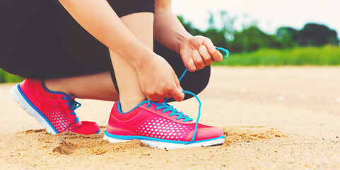 Female runner preparing to jog